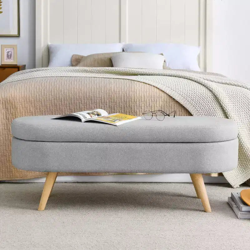 Banc de rangement ovale moderne en lin avec pieds en bois d'hévéa