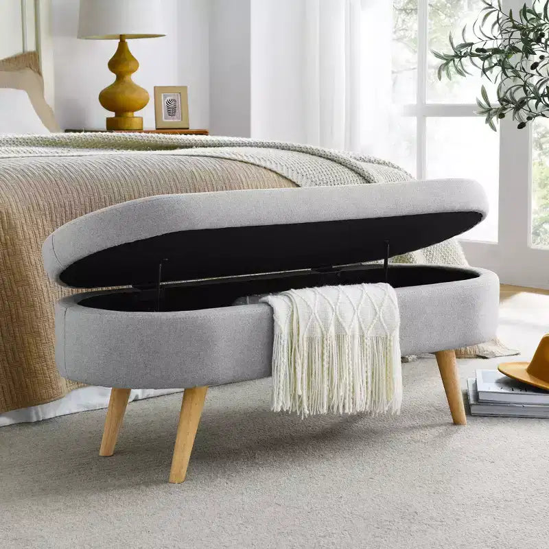 Banc de rangement ovale moderne en lin avec pieds en bois d'hévéa