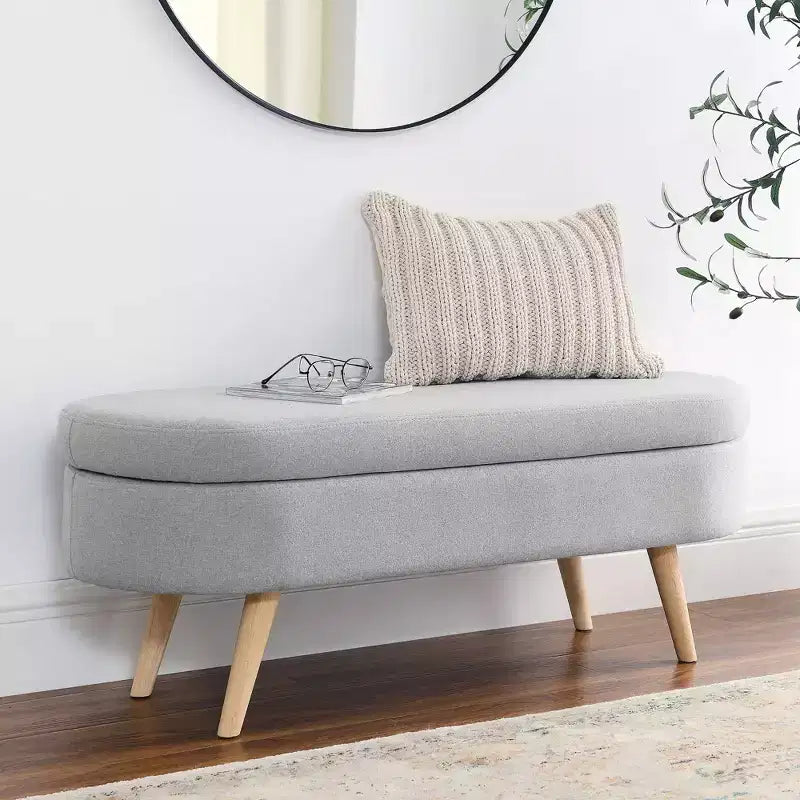Banc de rangement ovale moderne en lin avec pieds en bois d'hévéa