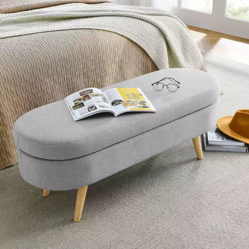 Banc de rangement ovale moderne en lin avec pieds en bois d'hévéa