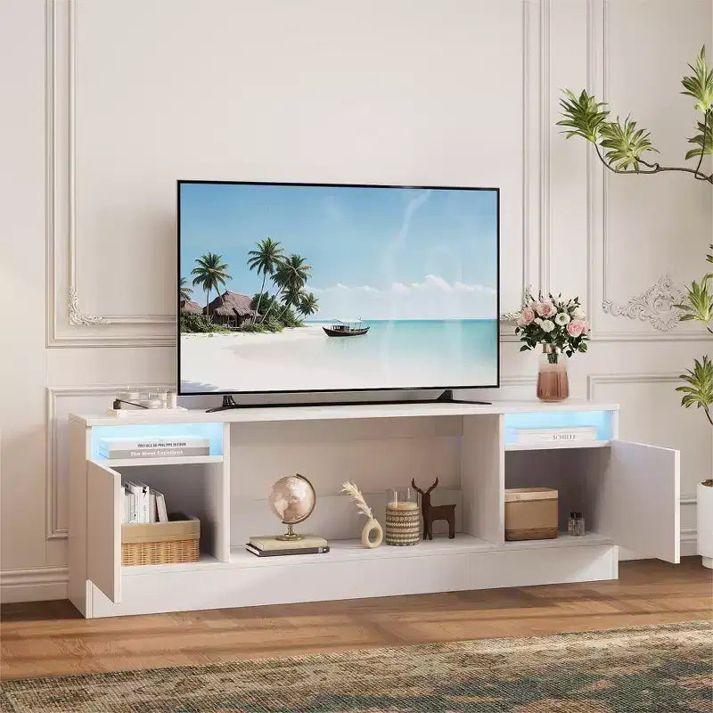 Modern TV stand with LED lighting, featuring storage cabinets and shelves, suitable for bedrooms and living rooms.