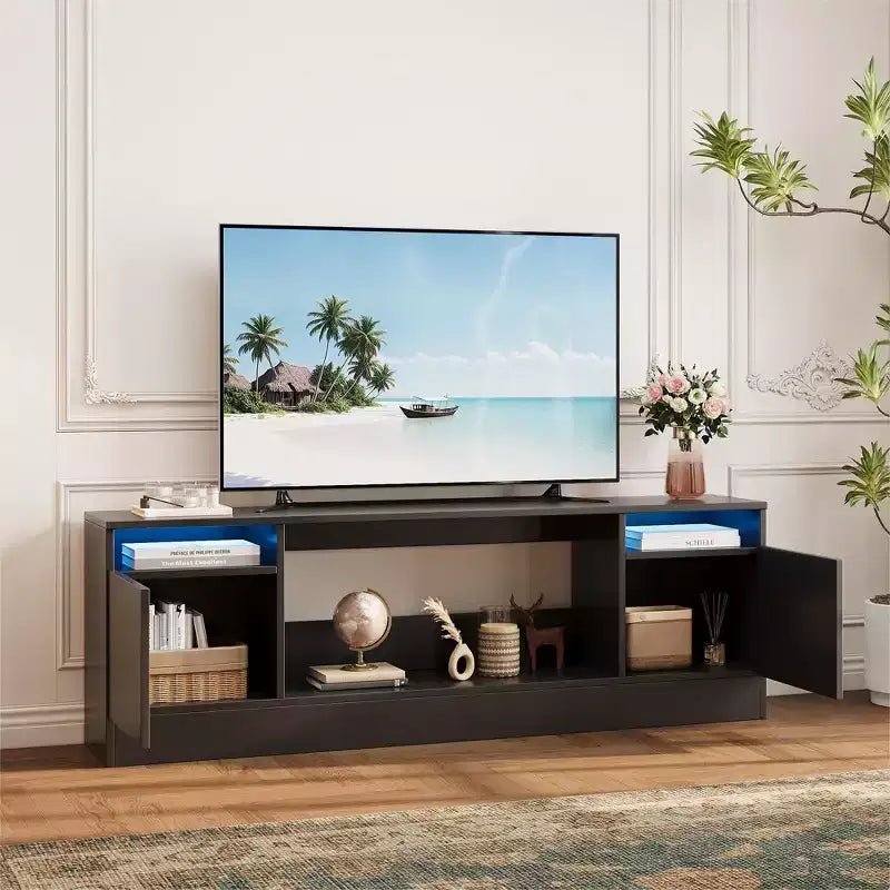 Modern TV stand with LED lighting, featuring storage cabinets and shelves, suitable for bedrooms and living rooms.