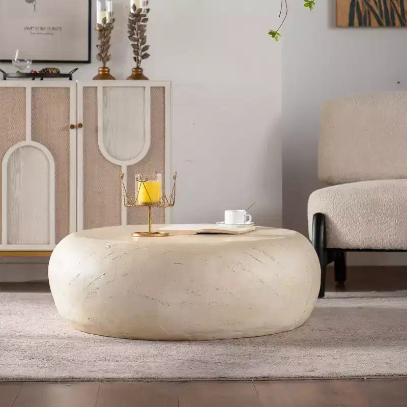 Table basse ronde en oxyde de magnésium avec finition aspect pierre
