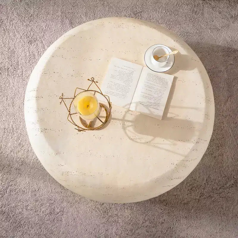 Table basse ronde en oxyde de magnésium avec finition aspect pierre