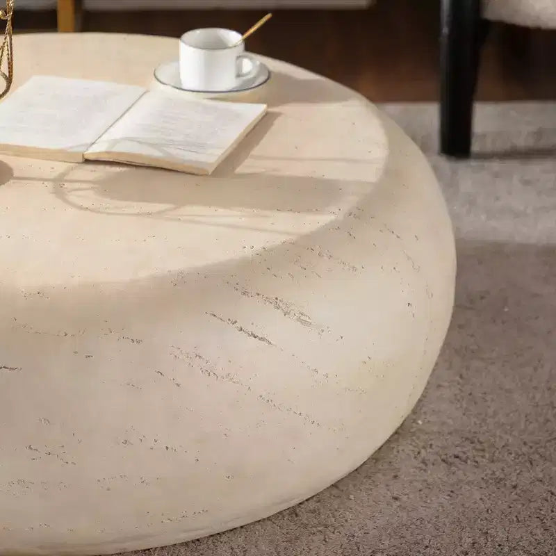 Table basse ronde en oxyde de magnésium avec finition aspect pierre