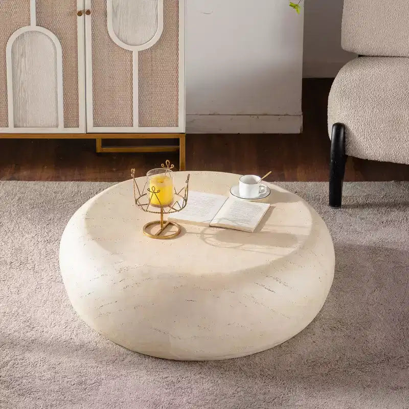 Table basse ronde en oxyde de magnésium avec finition aspect pierre