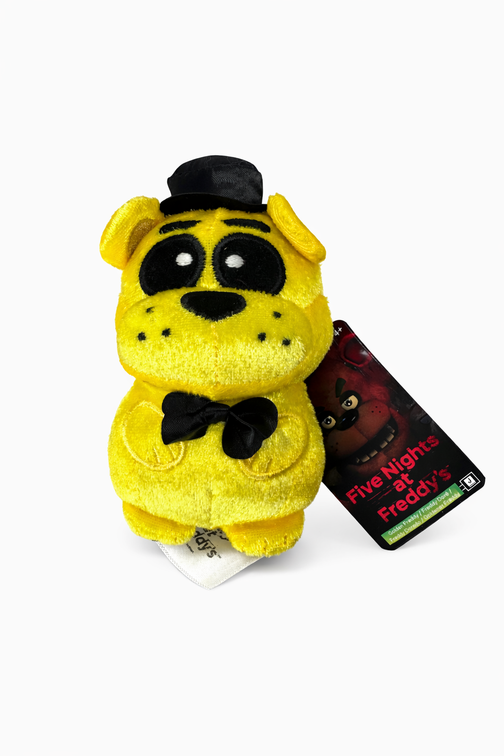 Five Nights at Freddy's Golden Freddy Peluche 10,2 cm – Peluche douce avec personnage d'ours jaune avec chapeau et nœud papillon